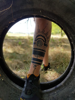 Healed lower leg tattoo