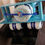 Thumbnail: Airplane Bear Diaper Cake with Blue & Silver Ribbon 2 Tier Bear Diaper Cake
