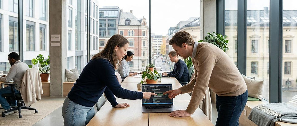 Data engineers collaborating in a bright Oslo office