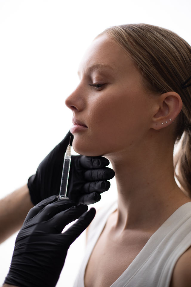 Dr. Adam doing lip filler technique