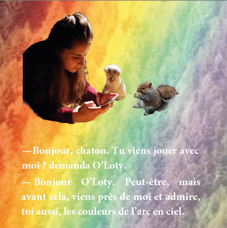Thumbnail: Page avec une jeune une fille, le chaton Kiwie et l’écureuil O’Loty en train de regarder un livre avec des animaux