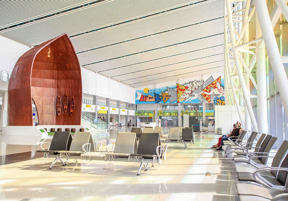 Modern airport waiting lounge with art installations and cultural motifs designed to improve traveler comfort and experience.