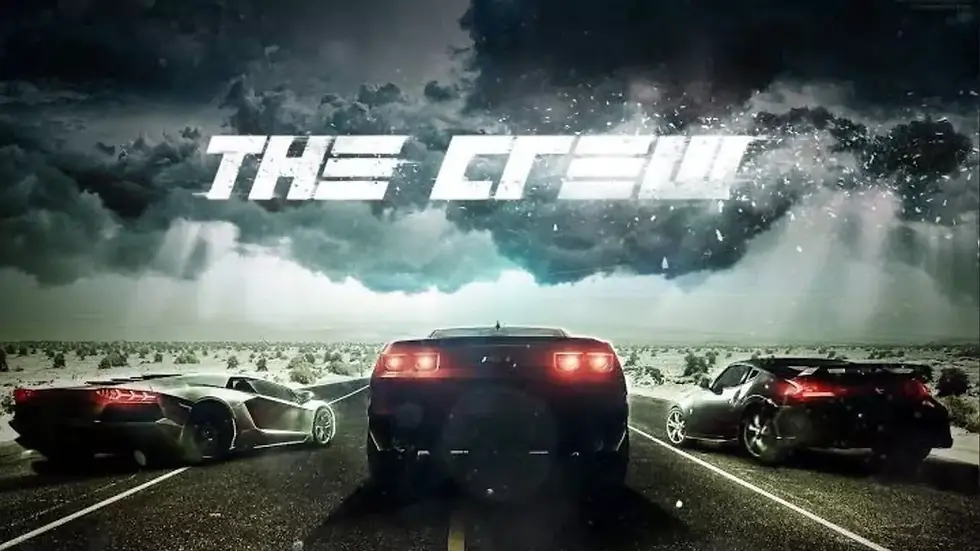 Three sports cars on a dark road under stormy skies. "The Crew" text glows above, creating a dramatic, intense atmosphere. its from the crew game.