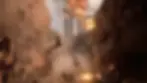Destruction scene from Battlefield with a helicopter amidst flying debris on a city street. Bridge in background is ablaze, with smoke and fire filling the sky. it's all about new map in battlefield 6 shown in trailer.