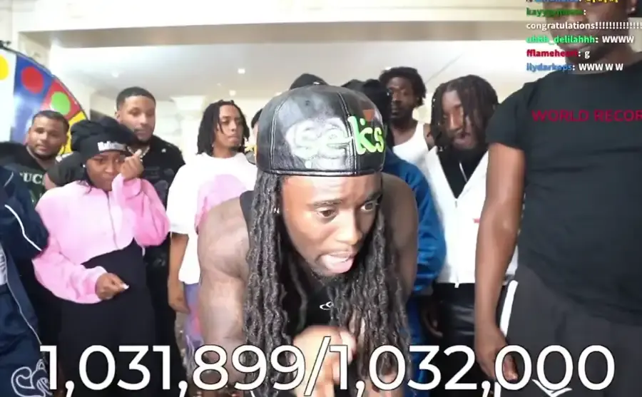 Kai Cenat, on a Twitch live stream celebrating the 1 million subs milestone with fellow streamers and friends.