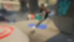 Skateboarder in skeleton suit performs a trick in a graffiti-covered skate park. Wearing sunglasses and cap. Mood is dynamic and playful.
