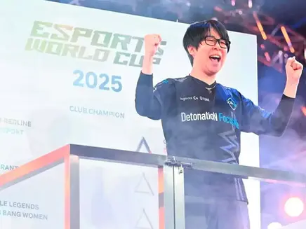 GO1 winner of Fatal Fury: City of the Wolves Tournament at EWC 2025, celebrating.