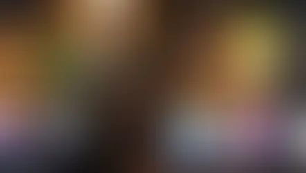 GTA 6 Character Jason with a watch leans against a tree, holding a phone. Neon lights, palm trees, and a parked car create a vibrant night-time scene.