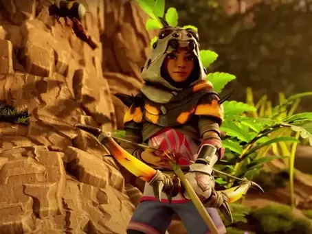 A character from Grounded 2 in armor holds a bow with a rocky cliff and lush green plants behind them. A bee is flying nearby. Warm lighting sets an adventurous mood.