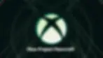 Glowing green Xbox logo on dark background with geometric lines. Text reads "Xbox Project Moorcroft" below, conveying a tech vibe.