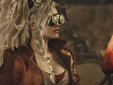 Blonde woman in goggles with braided hair holds torch in rustic setting. Wears red-brown jacket, focused expression, warm glowing light. She's Gemma from Monster Hunter Wilds.