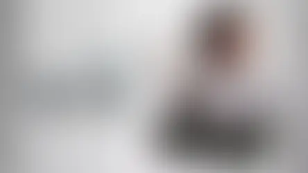 A woman with braided hair in white attire stands beside a gnarled tree. Text reads "South of Midnight." Birds fly in a cloudy sky.