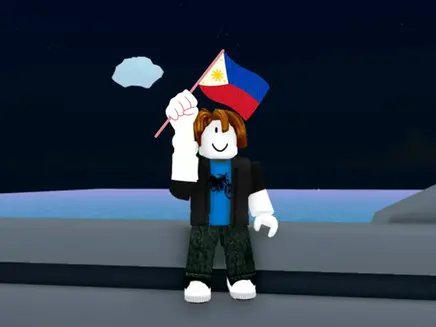 A smiling Roblox character holds a Philippine flag under a dark sky, standing by a body of water. A cloud is visible in the background.