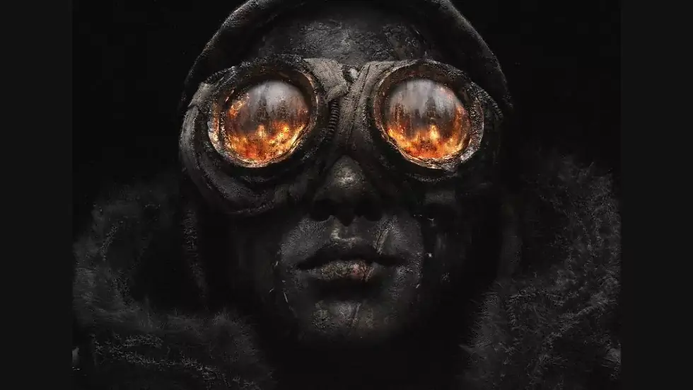 Person wearing goggles reflects fire, creating an intense and mysterious mood. Dark clothing and background enhance the dramatic effect. its from frost punk 2.