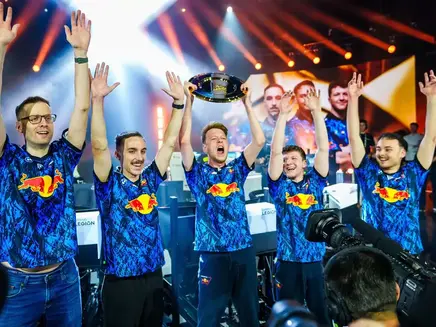 Team Redline winner of Esports World Cup Rennsport R1 2025 tournament. All five members are celebrating on the stage.