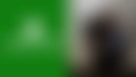 Split image with green Xbox Game Pass logo on the left and a poster of call of duty modern warfare on the right against a smoky background.