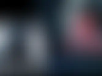 Futuristic scene with a person in a VR headset and a woman in bright armor under a glowing circle. Text "Krafton" in bold letters.