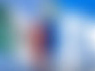 Mexican flag waves beside a CD and large PlayStation logo on blue sky, with a Gaming Amigos watermark.