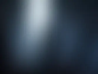 A figure stands in a dark room with towering, jagged saw-like blades. The light from a large doorway casts an eerie glow, creating a tense mood. its boss from Clive Barker’s Hellraiser Revival video game.