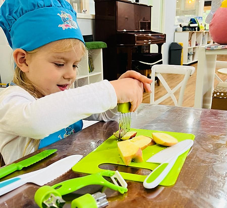 Allegra cutting fruits.jpg