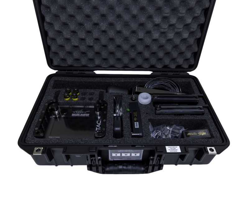 E-tac unit hand-held unit in its protective carry case.