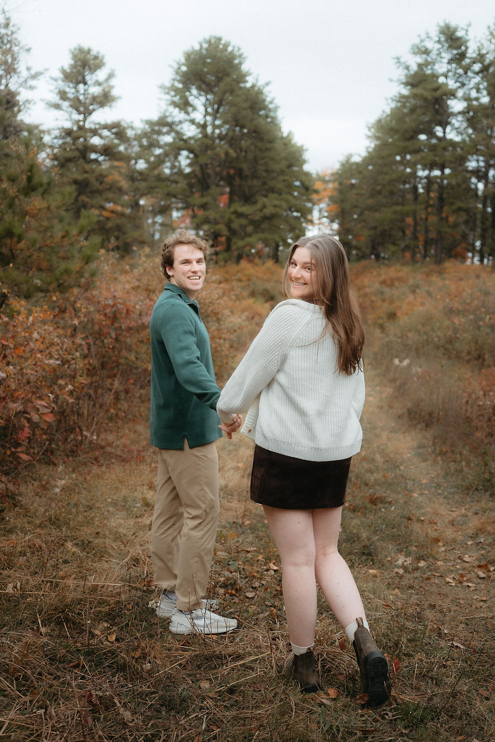 Couples portraits at the Albany Pine Bush Preserve during peak autumn color, captured on a softly overcast fall day by Benjamin Jennings Studio