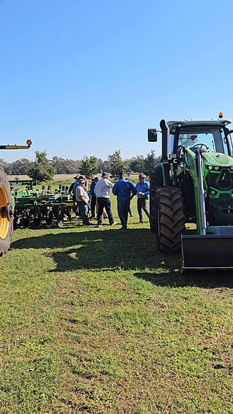 Farmers gathering around a Great Plains Max Chisel at a Total Ag Solutions demo day in Cowra, having a conversation.