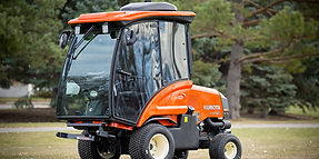 A Kubota TerraCab driving in the field.