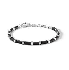 Bracciale uomo Mineral Comete Gioielli in acciaio con elementi in ematite nera e dettagli in acciaio lucido.