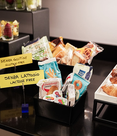 Lactose-free selection from Hotel Maritan in Padova with snacks, cookies, and options for an inclusive breakfast.