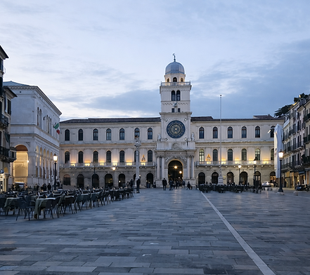 Piazza dei Signori Padua in the evening with the illuminated Clock Tower near Hotel Maritan Padua