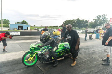 Tombo setting up racer on drag strip