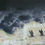 Thumbnail: Dark thunderclouds and two dark seagulls  flying
