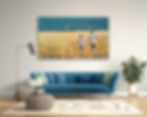 Canvas with golden yellow dune landscape, two monochrome running boys and dark blue-green sky over blue-green sofa