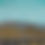 Thumbnail: turquoise sky above brown beige mountain