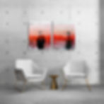 Thumbnail: On a concrete wall above two white chairs, a diptych of orange-pink urban art with faint text and a man and woman.