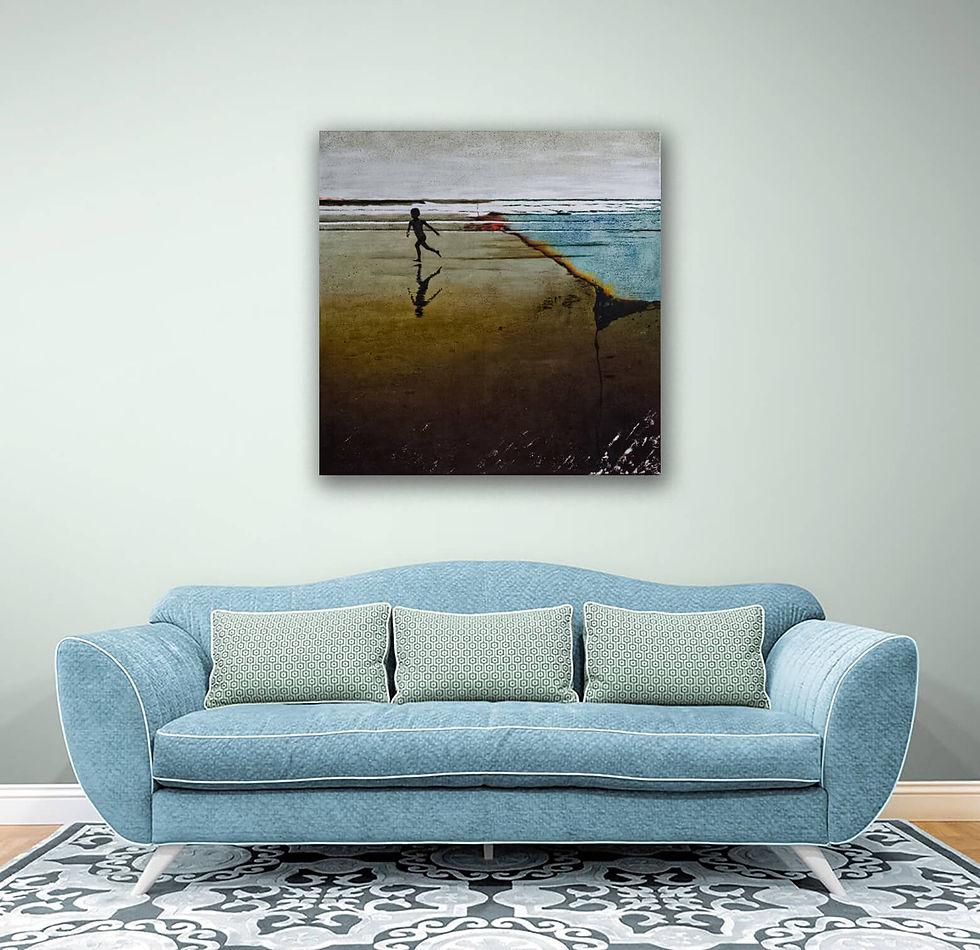 on wall above light blue sofa semi abstract beach scape in dark earth tones, white surf, beige sky and silhouette girl running