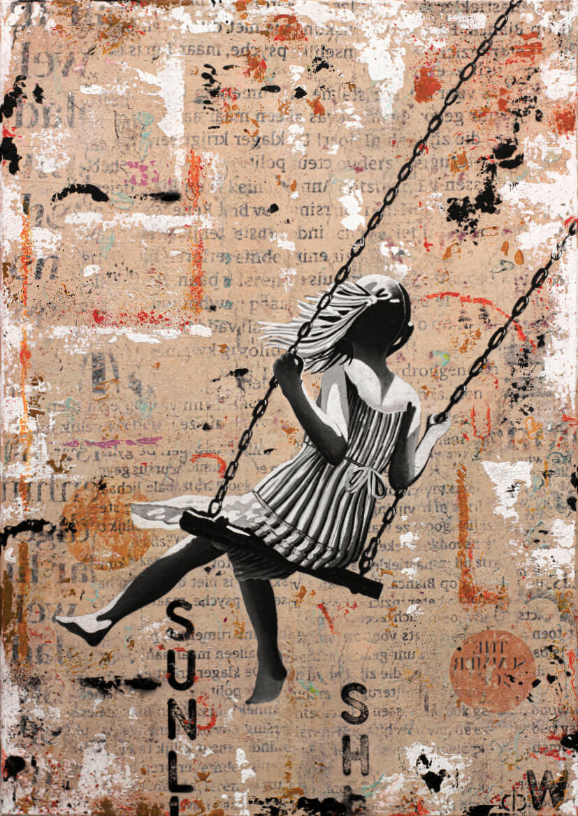 Beige street art wall with black, white, orange text and letters and girl in black and white on swing in foreground