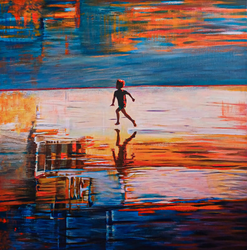 Silhouette of a boy running on the beach, surrounded by warm orange and blue reflections in the sea and sky
