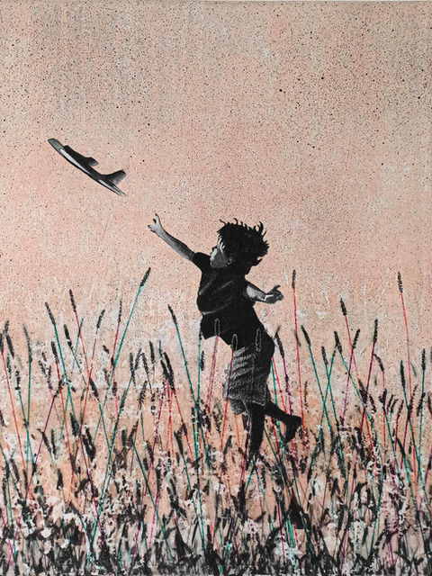 monochrome boy in dark reed pretending to throw a plane that's really in the sky against peach background