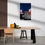 Thumbnail: Interior view with artwork of  boy playing hide and seek between concrete buildings