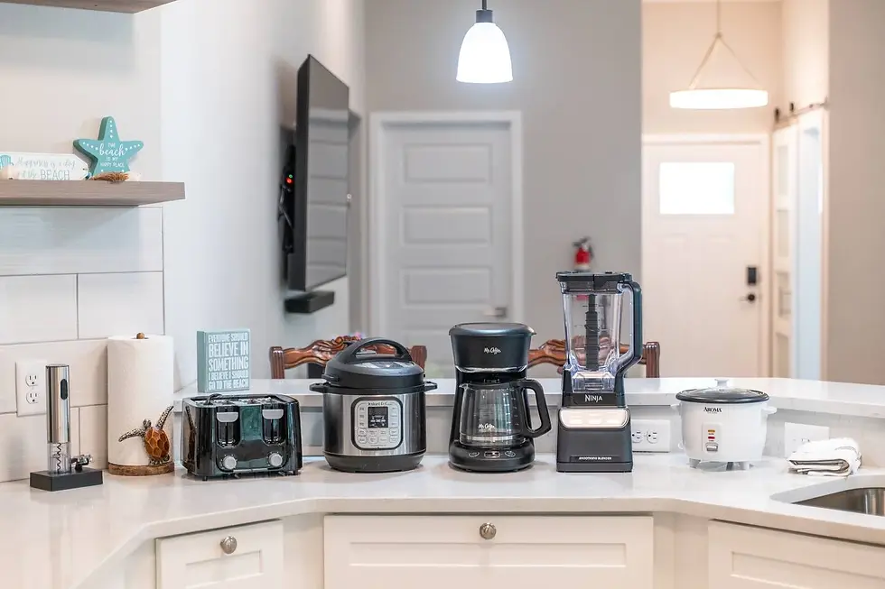 Coastal kitchen with modern appliances and beach decor in a St Augustine vacation rental listing