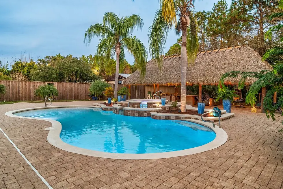 Luxury private pool with hot tub and tropical landscaping in St. Augustine Airbnb alternative