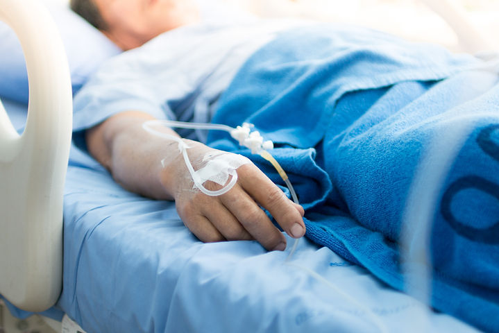 Focus on the hand of a patient in hospit