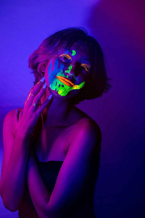 black light senior photography at night