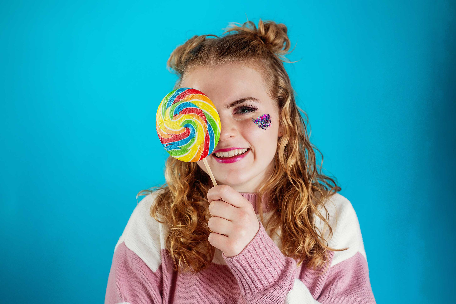 Winter Candy Theme Photoshoot with large lollipops and my Team26 Senior Reps