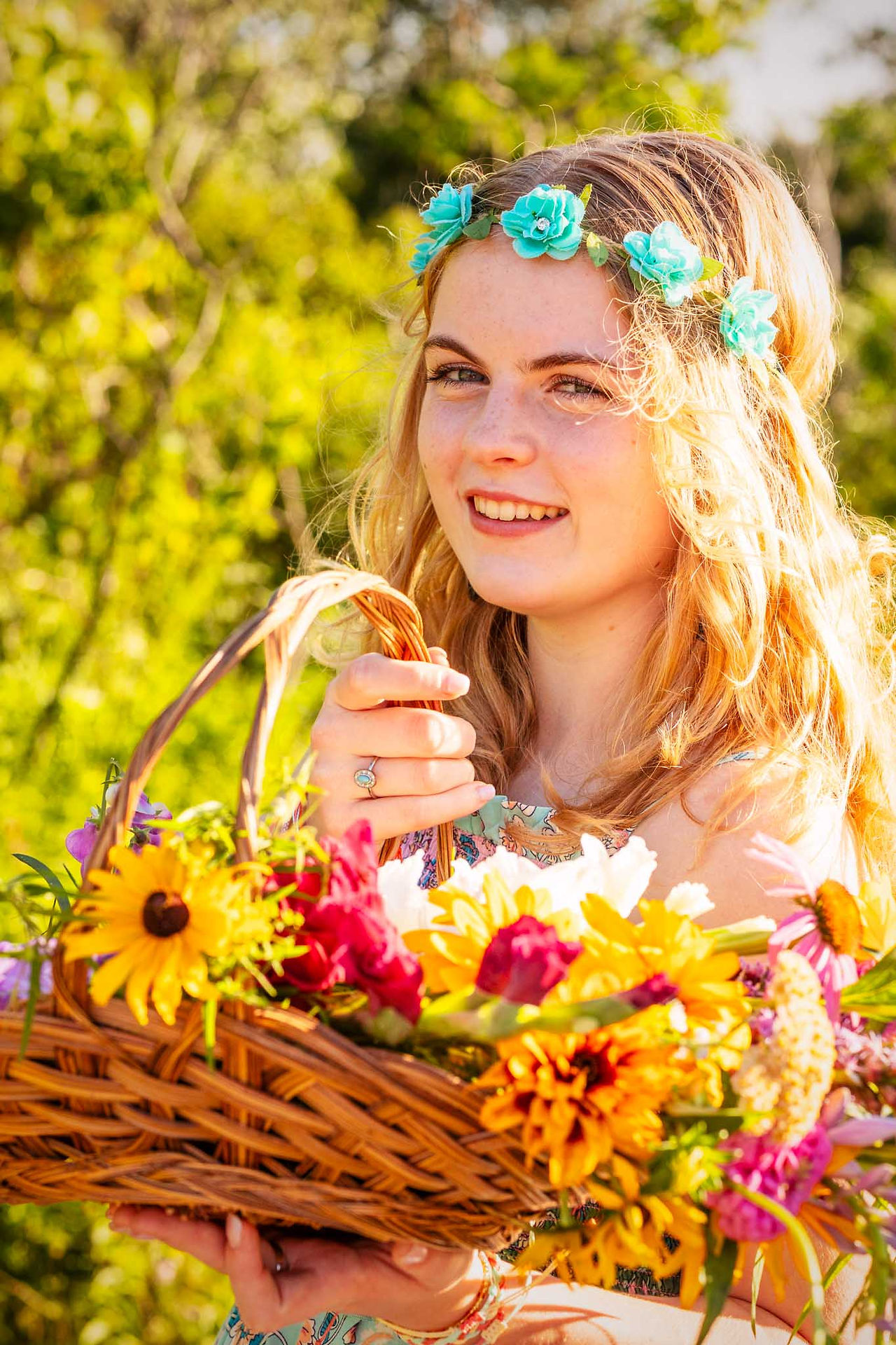 Boho Senior Rep with a flower crown and flower basket