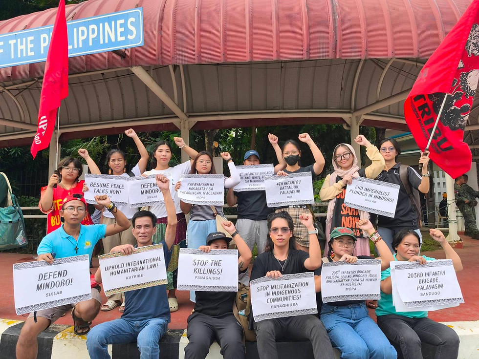 The Indigenous Peoples and advocates pose to oppose the continuing violations of human rights and International Humanitarian Law by state forces in Southern Tagalog.