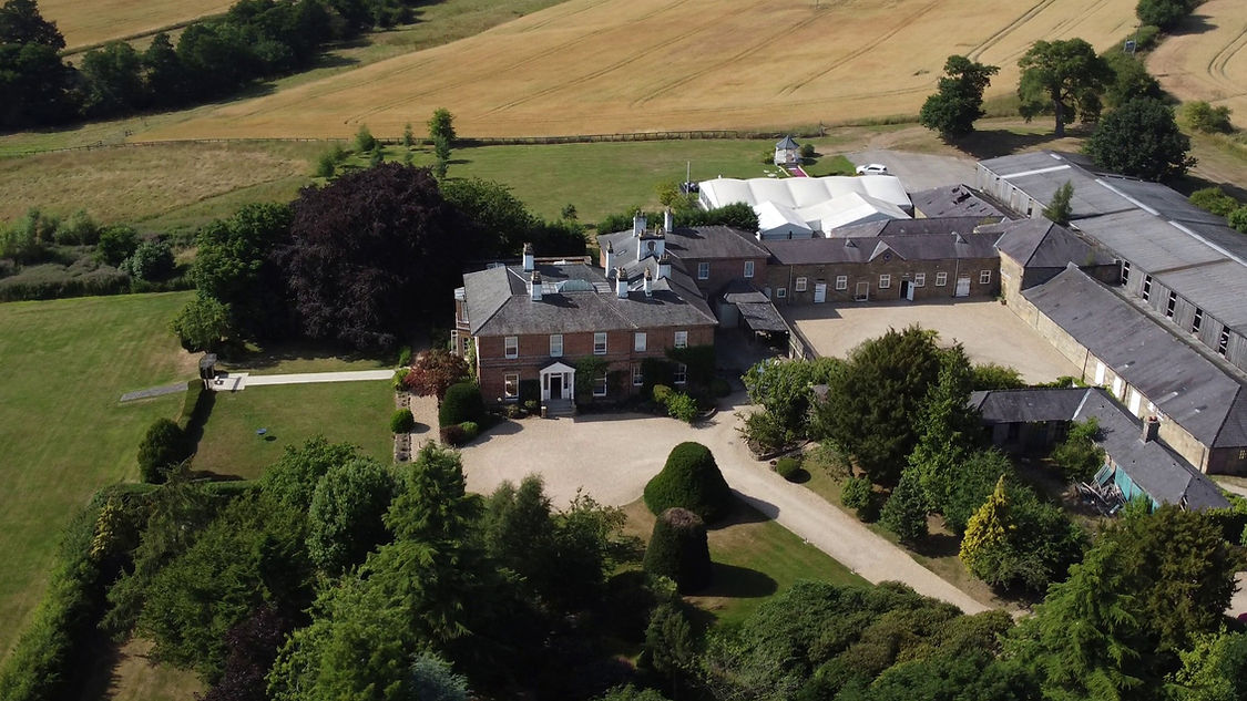 Drone shot of Shottle Hall, a beautiful Derbyshire wedding venue, captured by MFVideography for a cinematic wedding film.