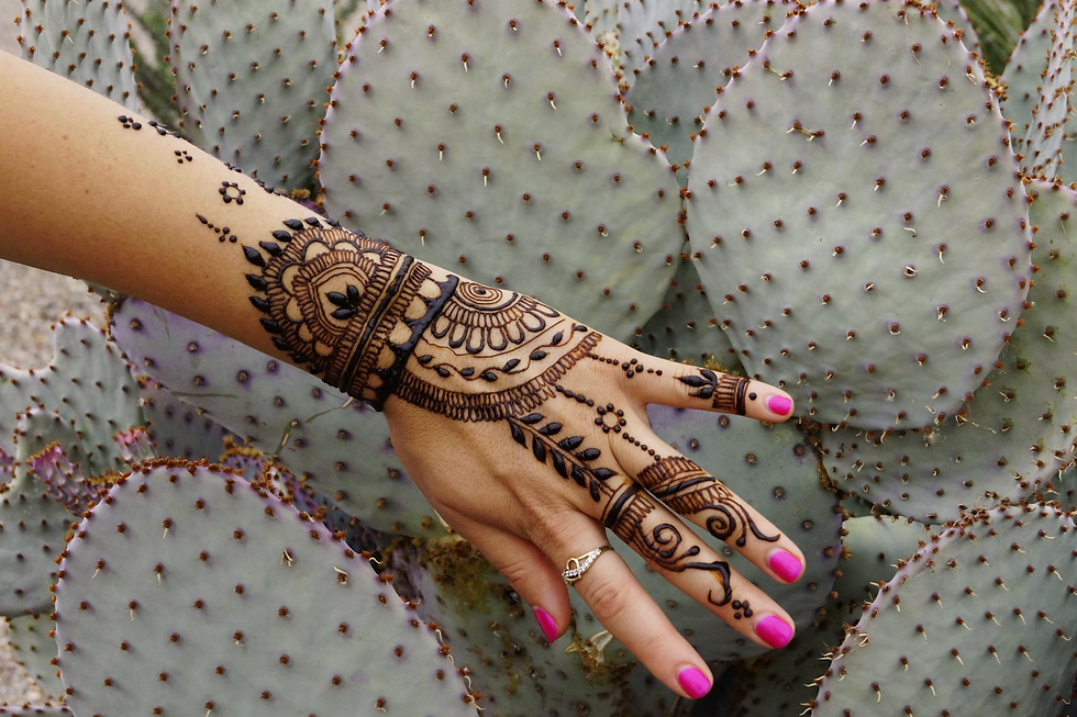 mehandi with tribal-style bands, leafy trails, and mandala accents on fingers